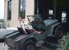 S0808 man in jeep going up stairs